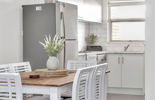 West Beach Apartment | 2 Bedroom Seaside Suite just Steps from the Shore + Arcade & Balcony