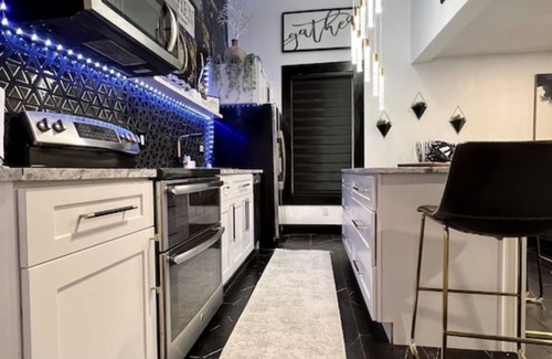 Clearwater House | 2 homes next to each other.Heated Pool, Spa & Backyard Games!