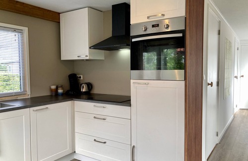 Anjum Ski Chalet | 4 pers house Cecil with own fishing spot on a dutch chanel