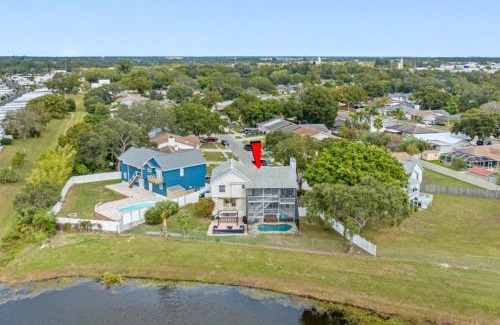 Largo Villa | 6 BR Waterfront Retreat Heated Pool and Game Room