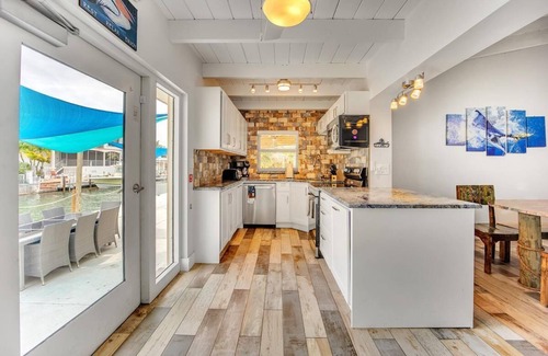 Marathon House | 6BR/6BA Pelican's Nest: Oceanfront Home With Pool, Tiki Bar, and 150' Boat Dockage