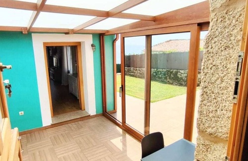 Boiro House | A Casiña de Cabo, is located at the foot of a quiet cove with clean waters.