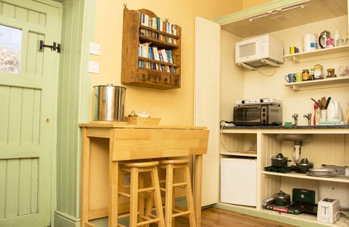 Mountrath House | A gardener's cottage tucked away in the corner of an old country house estate.