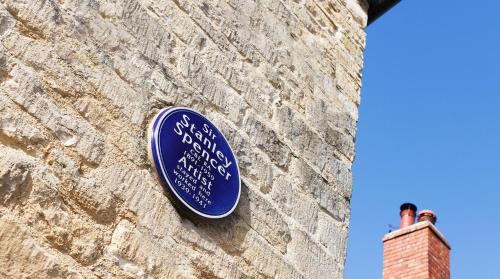 King's Stanley House | A handsome large 9 bedroom 17th Century village house moments from The Cotswold Way offering modern luxury in a peaceful location
