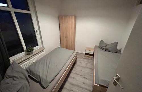 Oberdorla Apartment | A place to stay - single beds, tv