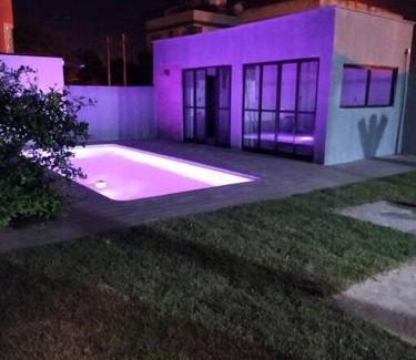 Campo d'Aviacao House | Aconchegante casa de Madeira com linda área lazer!