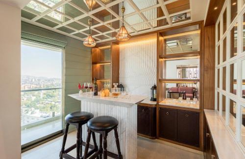 Lalkothi Villa | Alaya Stays Manhattan 1804 - 3 BHK Duplex With Stunning Views, Office & Stylish Bar