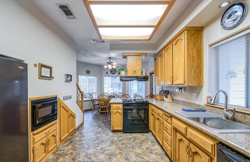 Bass Lake House | All-season forest hideaway with guest suite & boat slip - walk to lake & village