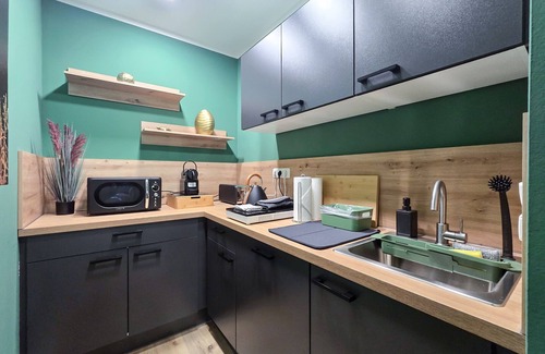 Dortmund Apartment | Alpha Apartments: Central, Cool, Cozy, Green Flair