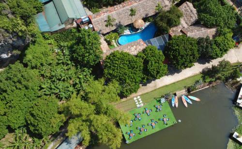 Hoa Lu Cabin | An Riverside Ecolodge