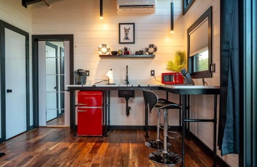 Sevierville Cabin | Anastasia & Grey "Treehouse" Hot tub. Riverfront.