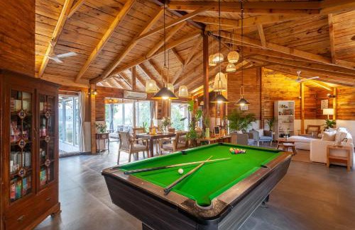 Karjat Villa | Anjee's Chalet by StayVista - Mountain-view villa with Classic wooden interiors, Lush lawn & Snooker table
