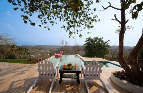 Karjat Villa | Anjee's Chalet by StayVista - Mountain-view villa with Classic wooden interiors, Lush lawn & Snooker table