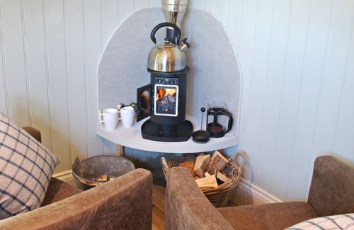 Tintern Cabin | Anne's Hut offers a romantic retreat for two in two interlinked shepherd's huts with decking area an