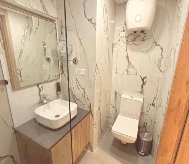 Jaypee Greens Apartment | Anom Stays