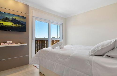 Canela Apartment | Apartamento HodsPrime com 2 Suítes by Achei