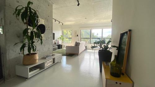 Itajai Apartment | Apartamento moderno no MaxHaus Praia Brava Piscinas, Academia e Vista Verde