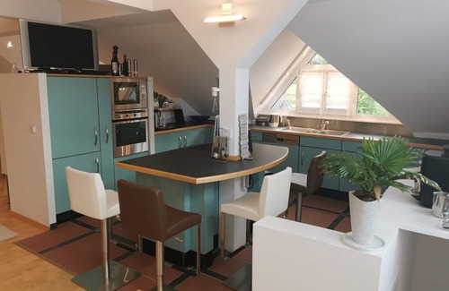 Altenkunstadt Apartment | Apartment/attic apartment with balcony, pool, terrace, barbecue and garden.