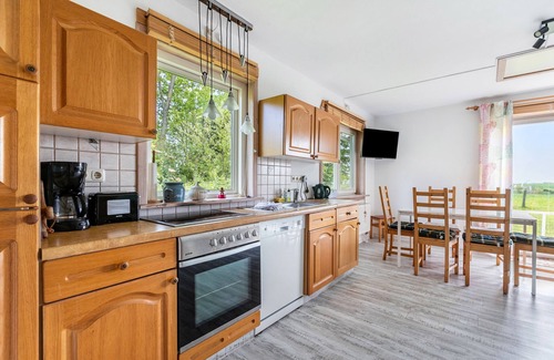 Saustrup Apartment | Apartment 'Ferienwohnung Erika' with Private Terrace, Private Garden and Wi-Fi