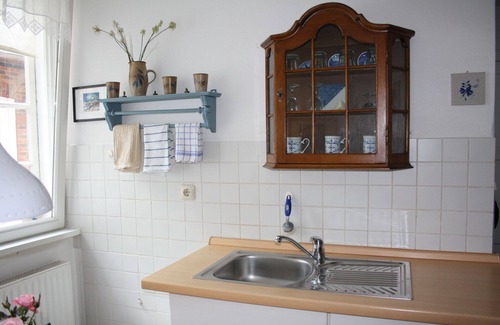 Friedrichstadt Apartment | Apartment in a historic house right on the water with boat and bicycles