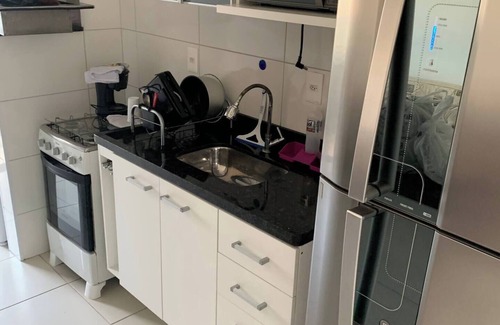Mirim Apartment | Apartment in Praia Grande with parking, close to the sea