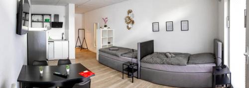 Goch Apartment | Apartment mit vier Einzelboxspringbetten - Netflix
