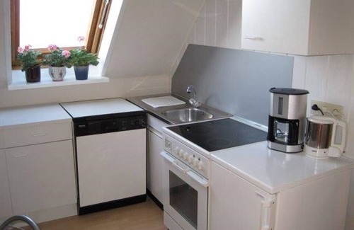 Haselund Apartment | Apartment 'Timmsen Haselund' with Shared Garden, Balcony and Wi-Fi