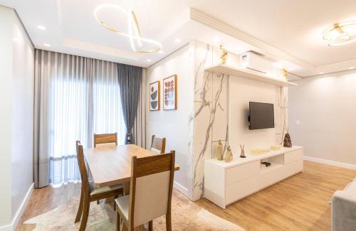 Nossa Senhora da Paz Apartment | Apto a 150m DA PRAIA e 15min BETO CARREIRO com WI-FI, PISCINA, PORTARIA 24h, PLAYGROUND INFANTIL, QUADRA DE ESPORTES sacada com CHURRASQUEIRA e vaga de GARAGEM