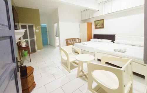 Kampung Ru Muda Hotel | AQIL BEACH INN