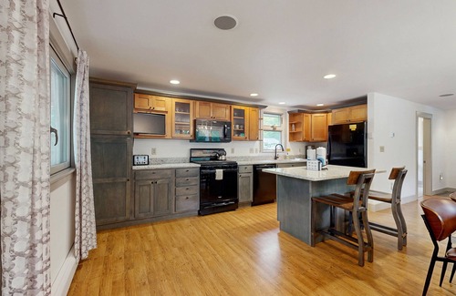 Sunday River Area Ski Chalet | Awesome mountain chalet with a hot tub, fire pit, and room for the whole family
