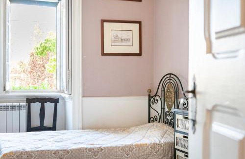 Ameal House | B&B Quarto Violeta com Chaminé