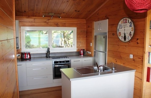 Lake Tarawera House | Bach 575, Lakefront with Boatshed