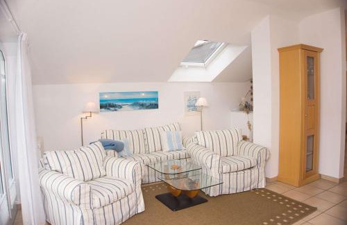 Gohren Apartment | Balkon mit traumhaften Meerblick, gratis Nutzung vom AHOI Erlebnisbad und Sauna in Sellin Dünenhaus FeWo05