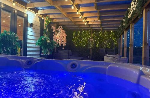 Cronberry House | Barlosh kiloch Tpod Lodge, Ayrshire, elec jacuzzi, bbq, Firepit, indooroutdoor terrace with outdoor sofa, egg chair,dinning country views,etc very spacious inside and out