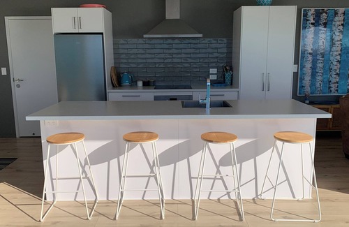 Tairua House | Beach and ocean views in every room.