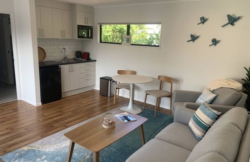 Waikanae House | Beach Road Bach is a newly renovated guesthouse across the street from the beach
