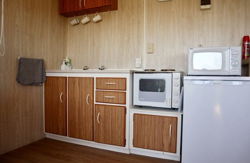 Pataua Cabin | Beachside Cabin with view of Mount Pataua and Surf bar