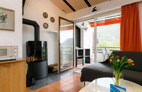 Capriasca Apartment | Beautiful apartment for 4 people with WIFI, pool, TV, patio and panoramic view