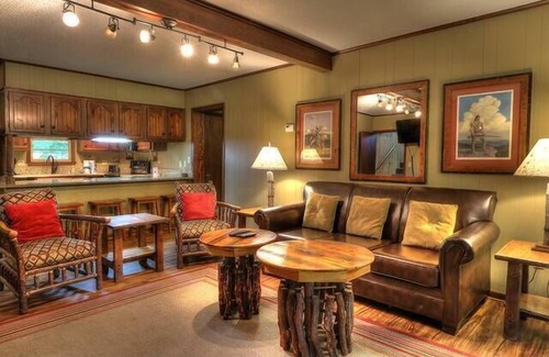 Pittman Center Cabin | Beautiful riverside cabin, sleeps 18!