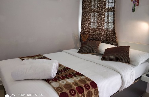 Mysore Hotel | Beautiful Rooms Surrounded by Nature in heart of Mysore