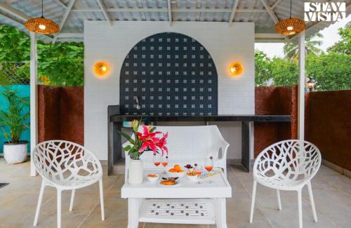 Varchi Ali Villa | Belas Palmeiras by VEO - Part of StayVista with Pool & Bonfire