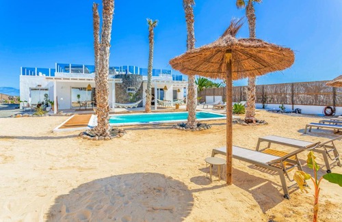 Charco del Palo Villa | Boutique Beach Villa by Lanzarote Retreats - Private Pool - 1 min walk to Sea Pool