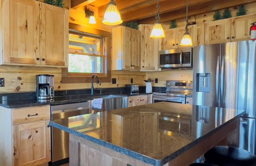 Chalet Village North Cabin | BRAND NEW! True Log Cabin! Mountain Views, Hot Tub, Game Room, 4bdr, sleeps 12.