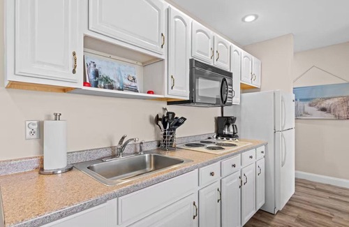 Kewadin House | 🍁 Breathtaking Torch Lake View Condo | Sunrise + Golf ➠ 741