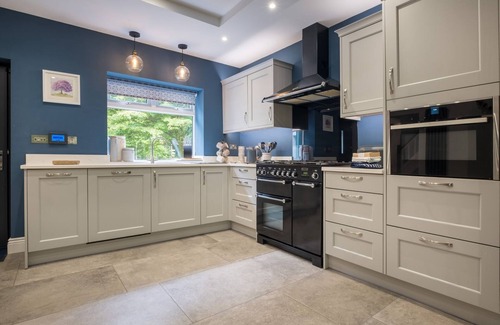 Skelwith Bridge Cottage | BRIDGE HOWE, with a garden in Ambleside