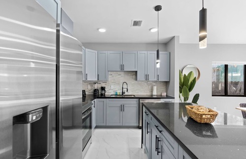 Liberty City Condo | Brown House
