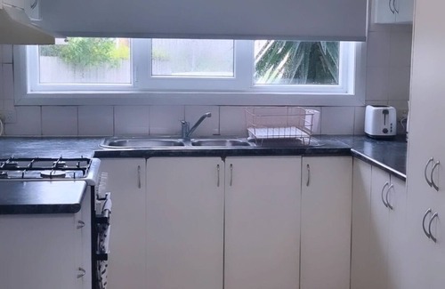 Dallas House | Budget 3BR home - 12 mins from airport, Bohemian Styled, great for small groups.