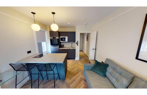 Hope Street Apartment | By Cathedral Kitchen Island Tv Wd Access