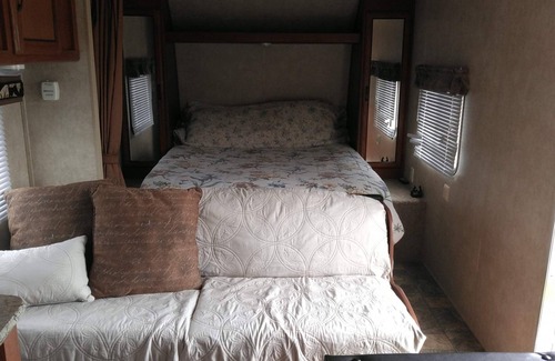 Waresboro Resort | Camper near pool at Pebble Hill RV Resort