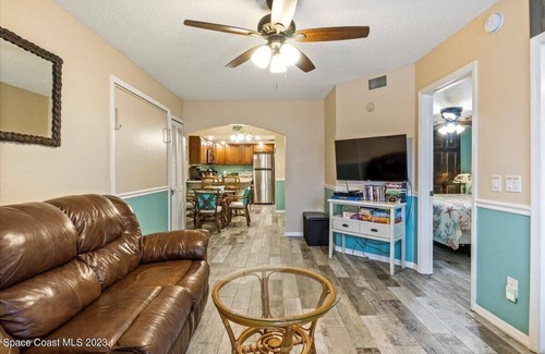 Port Canaveral Condo | Cape Canaveral Oceanside Oasis - 1st floor with bikes and beach toys
